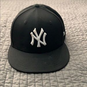 Black New Era Yankee Baseball hat. Size- 7 1/8